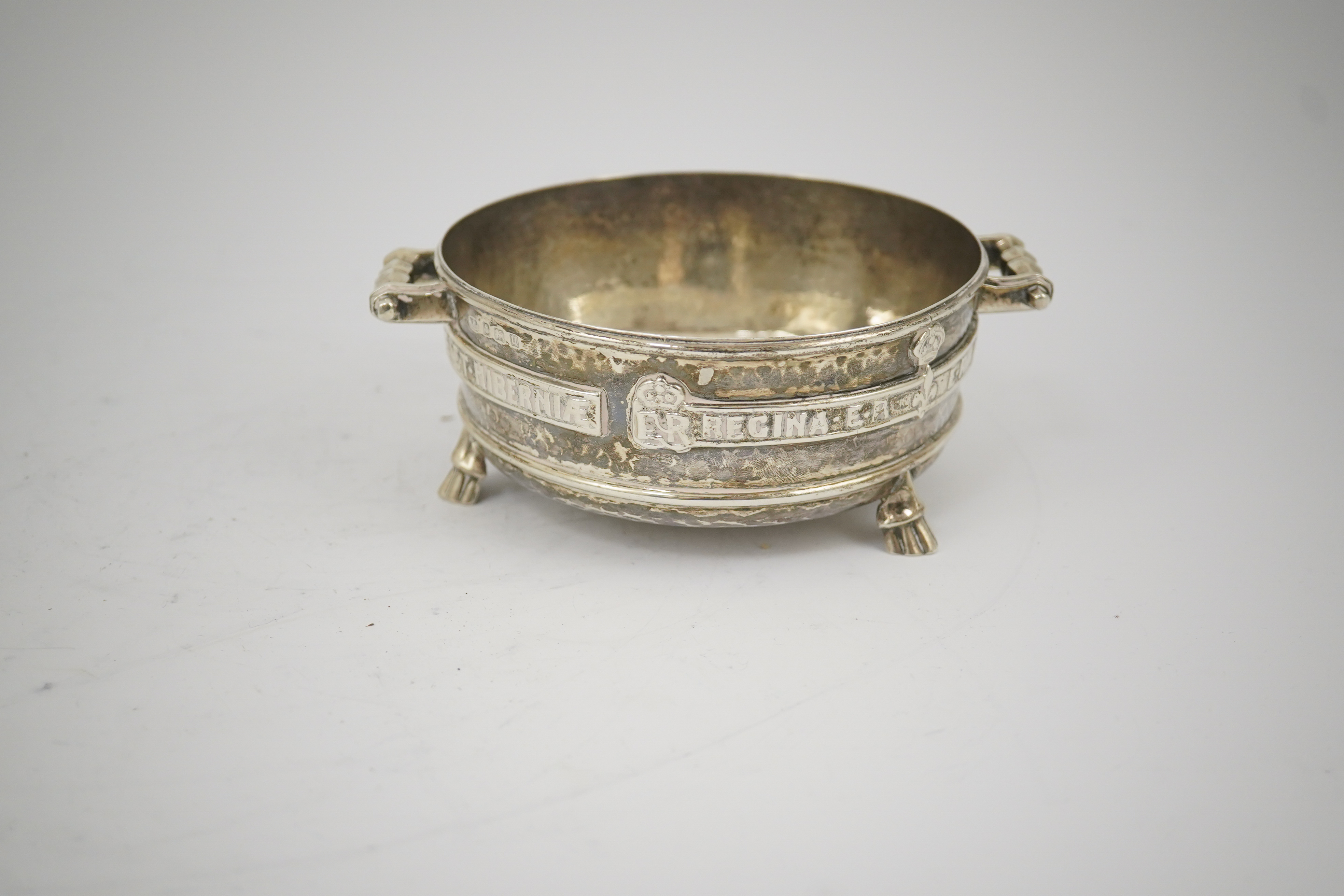 A George V Arts & Crafts planished silver replica of a late 15th century Winchester Bushel measure, by Albert Edward Jones